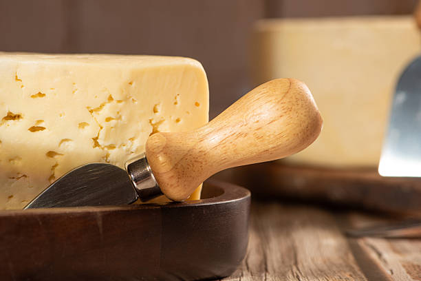 istock Minas Cheese, Delicious semi-cured cheese from Minas Gerais, Brazil, on rustic wood, selective focus. 2221197309