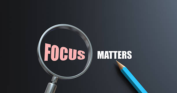 istock Top view of magnifying glass and Pencil with text, Focus matters 2221203395