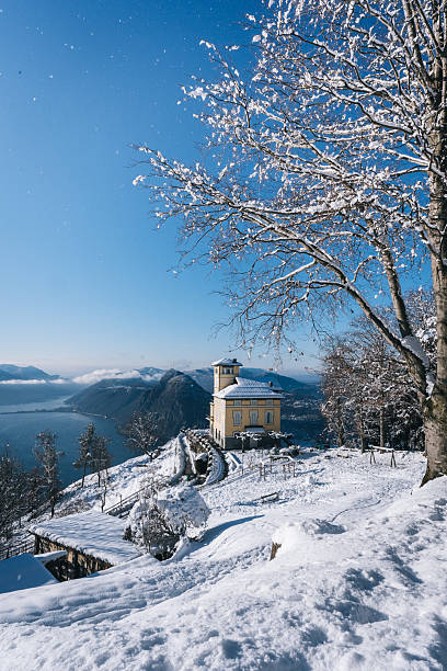 istock Viewpoint and  Lake Lugano in winter snow 2221206773