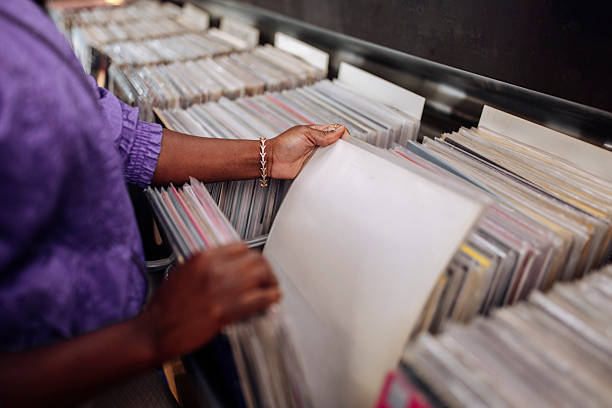 istock Browsing Vinyl Records in Retro Store 2221211687