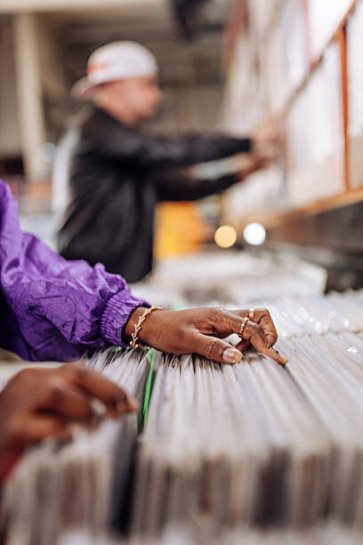 istock Browsing Vinyl Records in Retro Music Store 2221212381