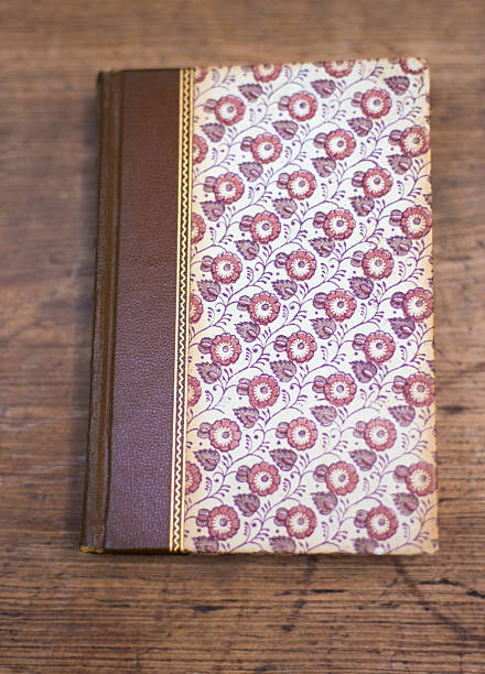 istock Antique Book and Glasses on Old Wood Table 2221226788