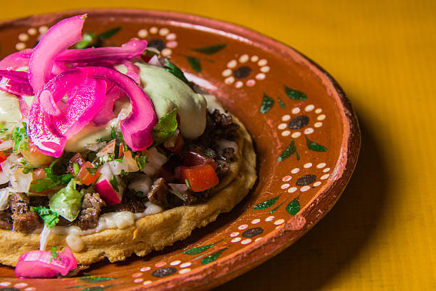 istock Artistic Sope with Beef and Colorful Garnishes 2221231294