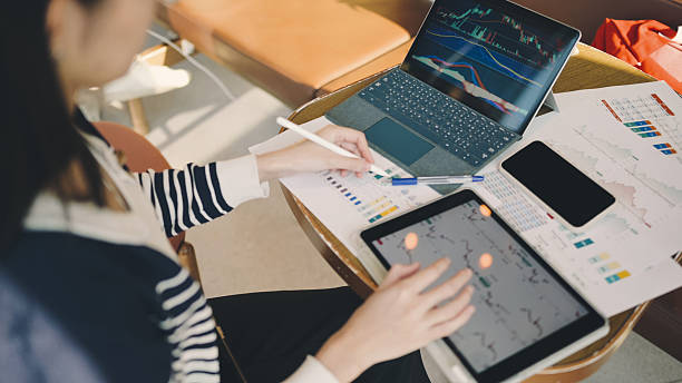 istock Modern digital Investing university student gen Z with Artificial Intelligence Using Smart Phone to selecting stock and fund in digital platform 2221239402