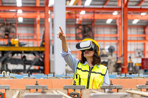 istock female engineer supervisor wearing VR glasses 2221244609
