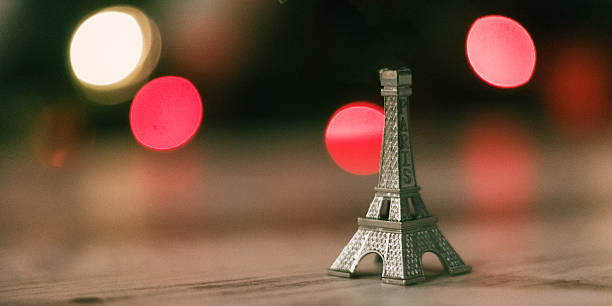 istock Miniature Eiffel Tower Souvenir with Bokeh Lights 2221244915