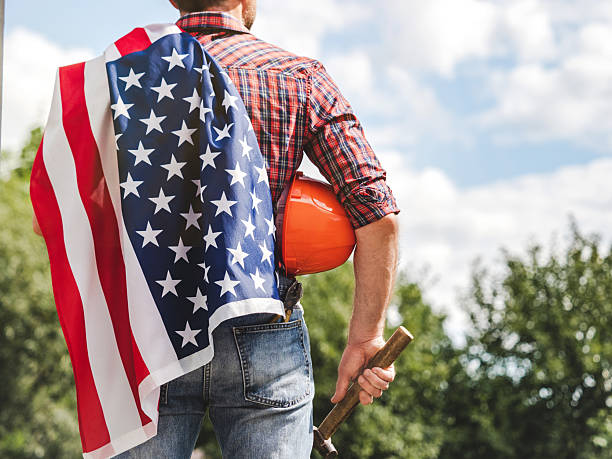 istock American flag and handsome man. Back view 2221255272