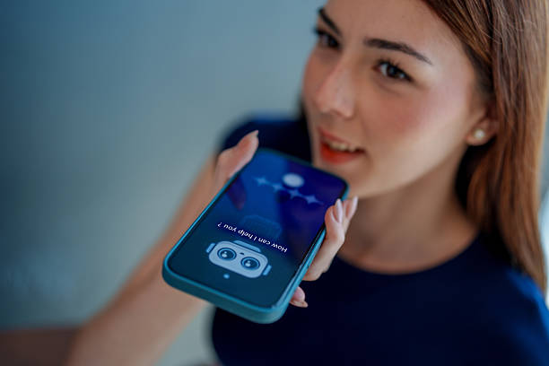 istock Woman is using smartphone with chatbot assistant displayed on screen, showcasing modern technology and communication. interaction highlights convenience of AI in daily life 2221256645