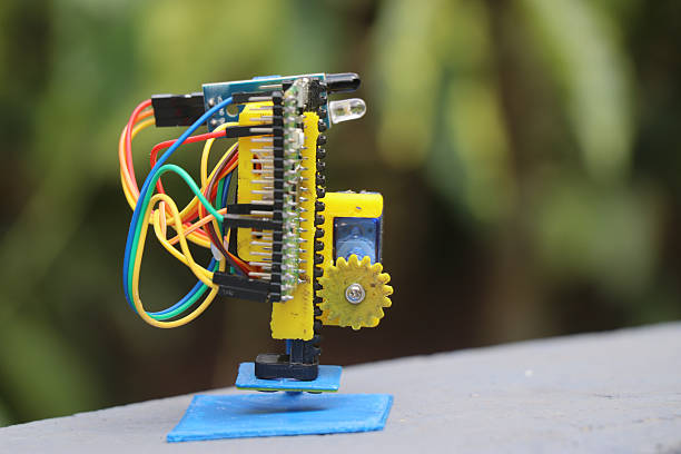 Micro servo with gear and slider mechanism on a 3d printed frame controlled by a micro controller connected using jumper cables