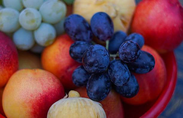 istock Various fruits in a red bowl 2221264115