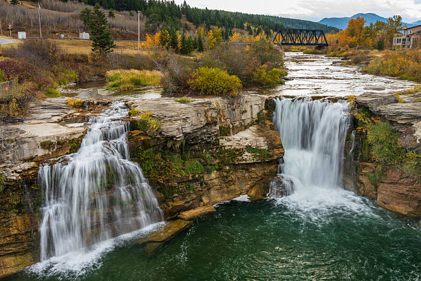 istock Lundbreck Falls on the Crowsnest River in autumn with railway bridge. Alberta, Canada. 2221269072