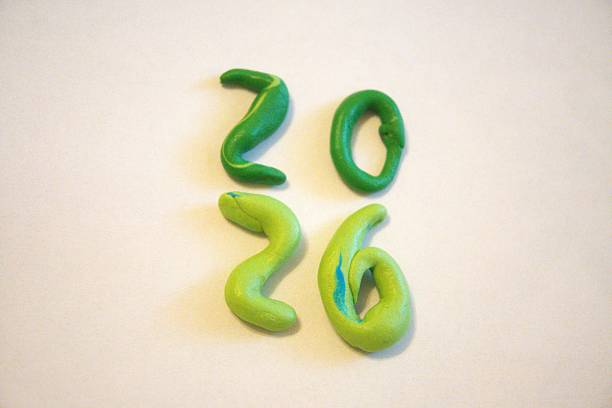 istock 2026 subtitle or text from green plasticine with white background. 2221271204