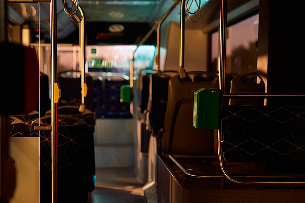 istock Empty bus at night showing stop request buttons and handrails 2221272520