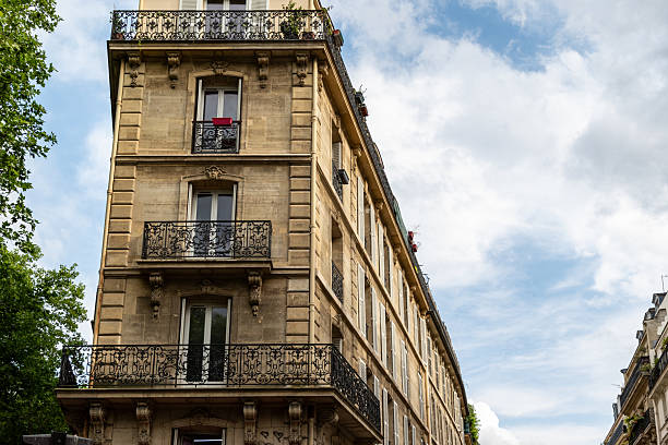 istock Parisian Building Exterior with Balconies and Windows 2221275444