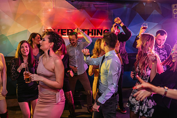 istock Young People Dancing At The Club Indoors 2221281879