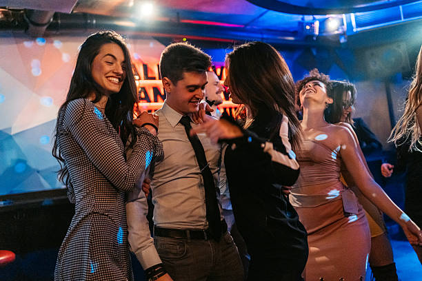 istock Young People Dancing At The Club Indoors 2221284143