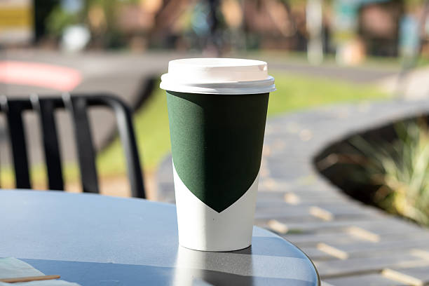 istock Green  white disposable coffee cups, Take away paper cups with Lid 2221284746