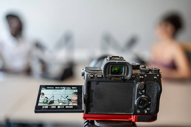 Professional Video Camera Recording a Podcast in a Modern Studio Setup