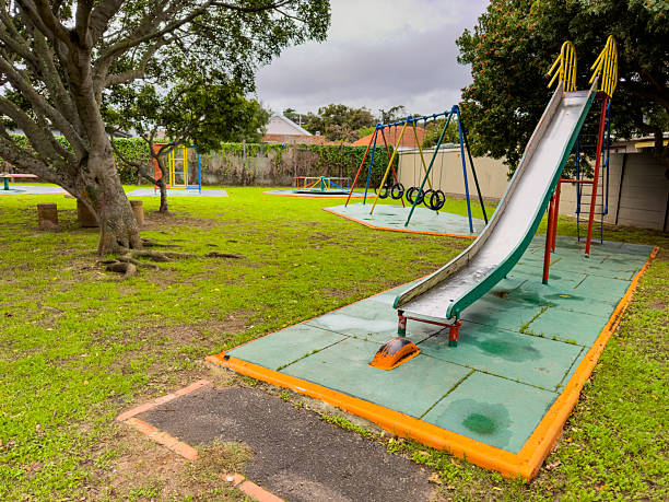 istock Public children's playground park on a cloudy day 2221295261