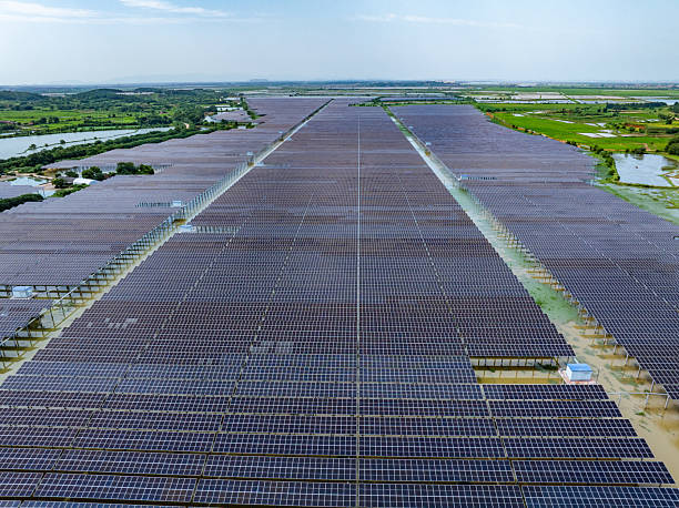 istock Solar photovoltaic panels and highways 2221302268