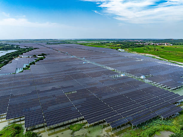 istock Solar photovoltaic panels and highways 2221302603