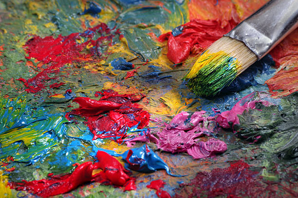 istock artist's palette and brush texture background. close up 2221305123