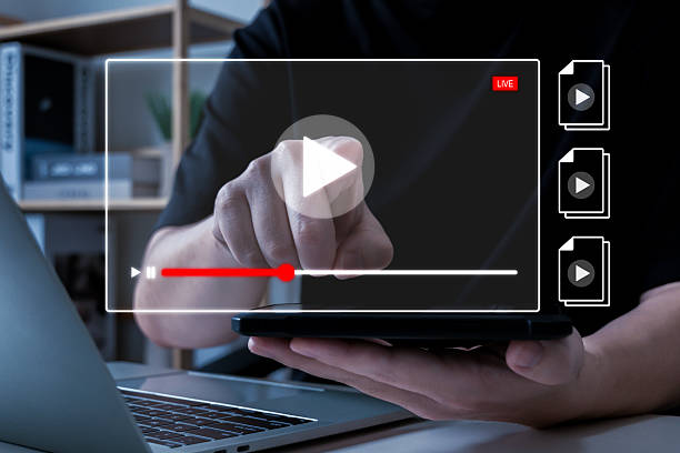 istock Studying Online via Video Player Interface, people watching content online streaming on laptop, online marketing, online study, virtual classroom, video tutorial, digital education technology concept 2221305313