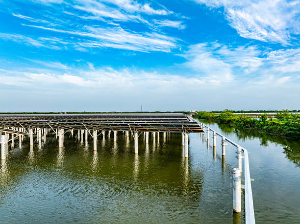 istock Solar photovoltaic panels and highways 2221305441