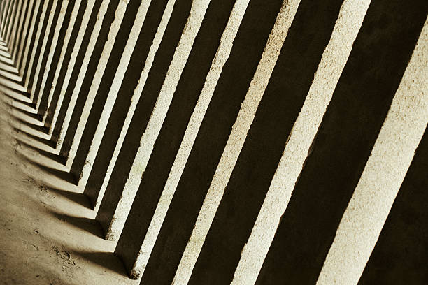 istock Symmetrical row of columns for maintain architectural structure, abstract angle view 2221305769