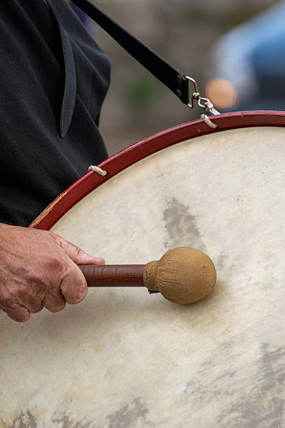 istock traditional frame drum with red rim and white ropes, authentic traditional music and percussive instrument 2221306691