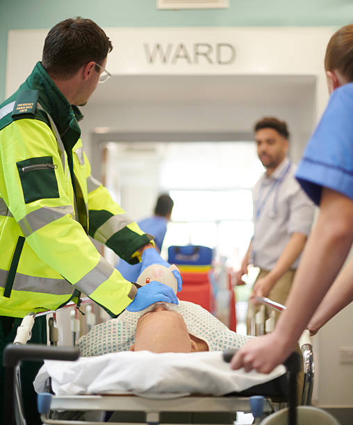 istock paramedic emergency transfer to hospital ward 2221309068