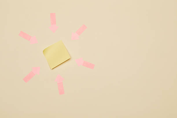 istock Red arrow stickers pointing to the one sticker note sheet 2221315472