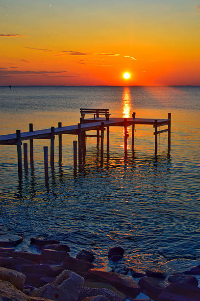 istock Sun rising over Chesapeake Bay and pier 2221320178