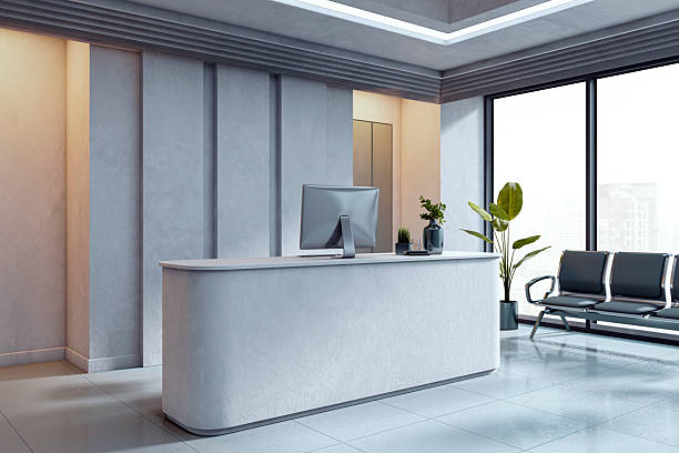 istock Modern light gray reception desk setup in a functional office lobby with city view, waiting area seating, and minimalist interior design concept. 3D Rendering 2221324993