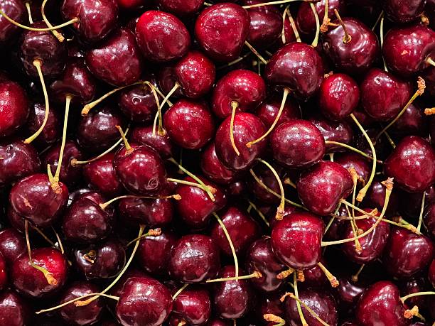 Ripe fresh red cherries background.
