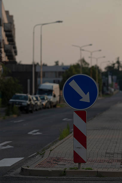 istock There is a blue sign displaying an arrow that is pointing to the right 2221334633