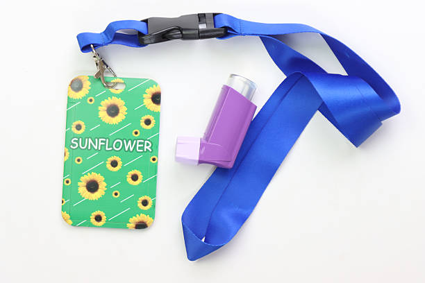 istock Hidden disability lanyard with a asthma device in a light background 2221337881