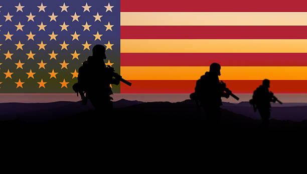 istock Conceptual image of war using American flag and silhouette 2221340204