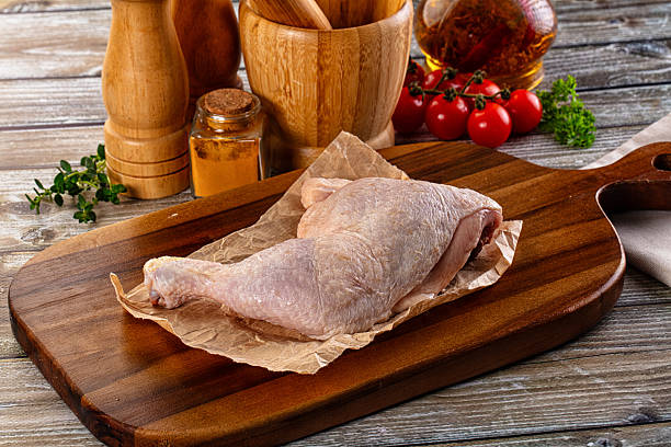 istock Raw fresh chicken leg with skin 2221345369