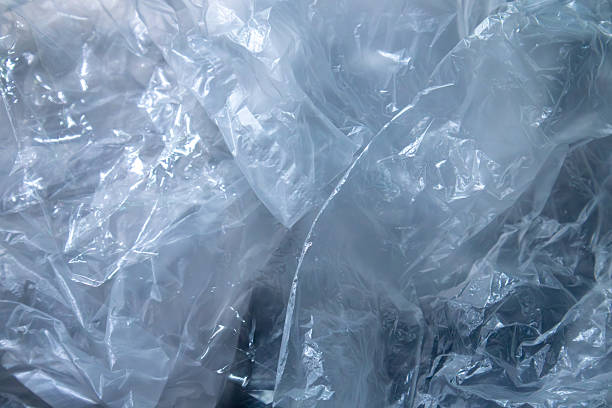 istock Transparent Plastic Bags Wrinkled Texture for Recycling or Packaging Background. Plastic Waste for Environmental Awareness Concepts. 2221345995