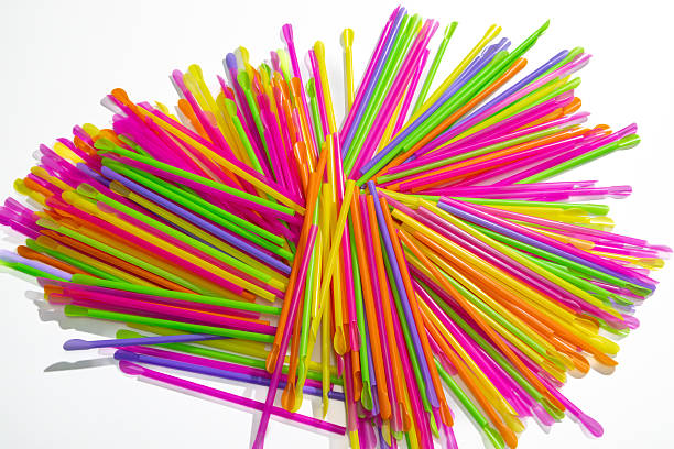 istock Colorful Plastic Drinking Straws Collection. Assorted Neon Straws for Beverages, Party Supplies, and Plastic Pollution Concepts. 2221346085