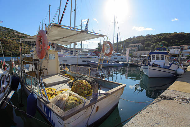 istock Fishing boat at harbor 2221346370