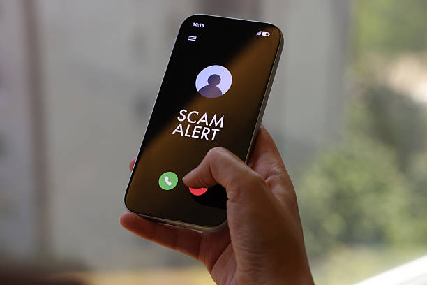 istock Scam Alert Notification on Smartphone Screen During Incoming Call 2221352760