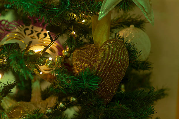 istock A beautifully adorned Christmas tree with a heart ornament 2221352957