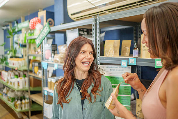 istock Store interaction. Colleagues discuss product details. 2221360799