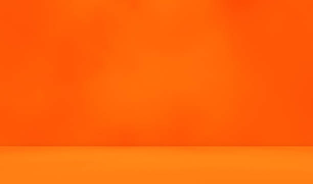 istock Empty orange golden yellow room for displaying the products. 2221361881