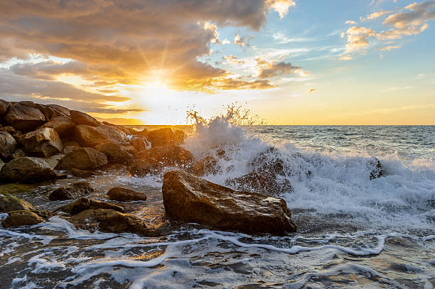 istock Sunset Ocean Wave Sea Water Spray Dramatic Seascape Rocks Nature Landscape 2221362221