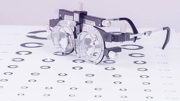istock A pair of eyeglasses sits on a white background with a circle pattern 2221364116