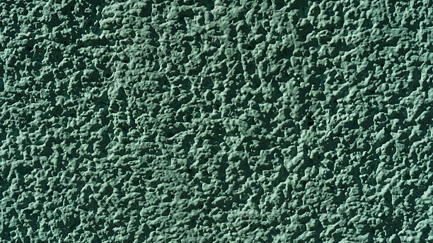 istock Green Rough Stucco Wall Texture Closeup 2221369120