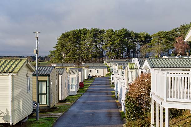 istock This is a row of identical mobile homes or park homes in a community setting. 2221374067